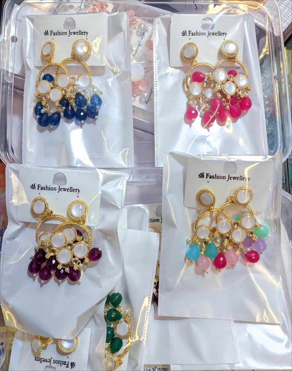 Gold Plated Kundan Stone And Beads Dangler Earrings